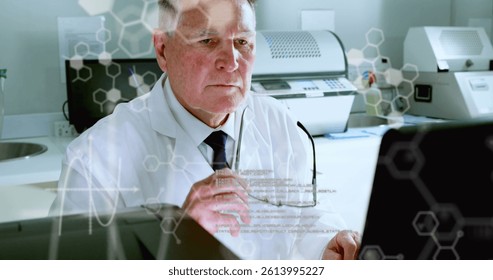 Image of scientific data processing over male scientist using computer. global science, research, data processing and digital interface concept digitally generated image.