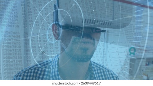 Image of scope scanning and binary coding over man wearing vr headset. global data processing, communication and global technology concept digitally generated image. - Powered by Shutterstock - Get 15% off with code: PIKWIZARD15