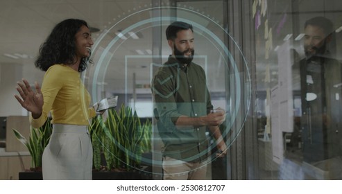 Image of scope scanning with cyber security text over diverse business people working at office. Global business, finances and digital interface concept digitally generated image. - Powered by Shutterstock