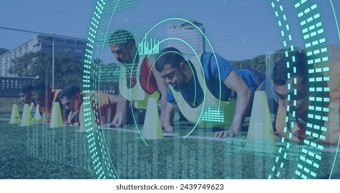 Image of scope scanning and data processing over diverse soccer players exercising. Global sport and digital interface concept digitally generated image. - Powered by Shutterstock