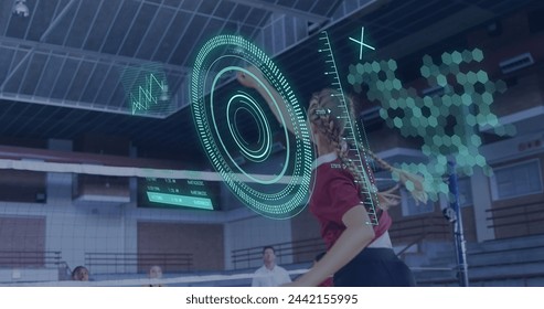 Image of scope scanning and data processing over diverse women playing volleyball at gym. Global sport and digital interface concept digitally generated image. - Powered by Shutterstock