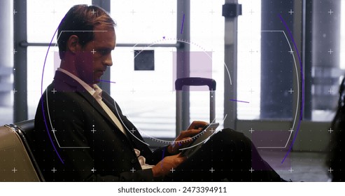 Image of scope scanning and data processing over caucasian businessman at airport. Global business, data processing and digital interface concept digitally generated image.