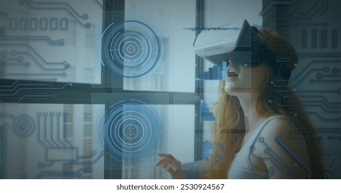 Image of scope scanning and data processing over woman wearing vr headset. digital interface, global connection and communication concept digitally generated image. - Powered by Shutterstock