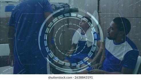 Image of scope scanning and data processing over diverse male football players in changing room. Global sports, competition and data processing concept digitally generated image. - Powered by Shutterstock - Get 15% off with code: PIKWIZARD15