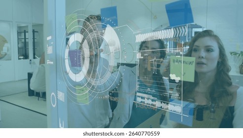 Image of scope scanning over businessman using laptop. Global business digital interface technology and networking concept digitally generated image.