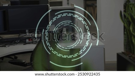 Image of scope scanning over empty office. Global business and digital interface concept digitally generated image.