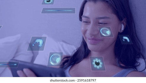 Image of scopes and data processing over biracial woman using tablet. Global connections, computing and data processing concept digitally generated image.