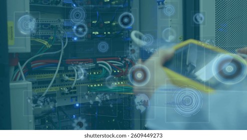 Image of scopes scanning and data processing on screens over man checking computer server. global connections, technology and digital interface concept digitally generated image.