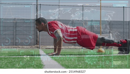 Image of screen with world map and data over biracial male soccer player doing push ups. Sport, soccer, finance and technology concept digitally generated image. - Powered by Shutterstock