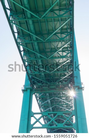 Image of a section of the Vincent Thomas Bridge in the Port of Los Angeles taken from right below.