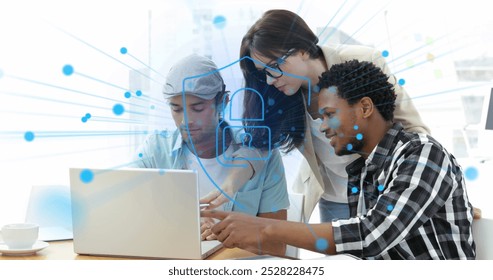 Image of security padlock icon against diverse colleagues discussing over a laptop at office. Cyber security and business technology concept - Powered by Shutterstock