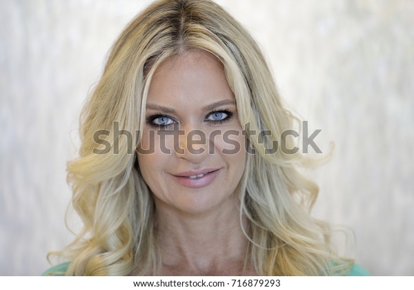 Image Sexy Mature Blond Haired Woman Stock Photo Edit Now 716879293