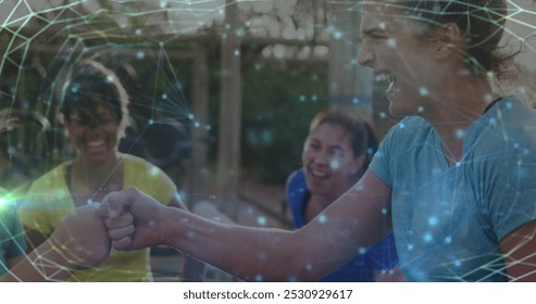 Image of shapes over diverse women at obstacle course fist bumping. Global sport, health, fitness and digital interface concept digitally generated image. - Powered by Shutterstock