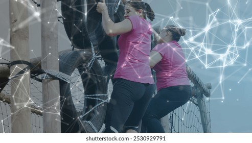 Image of shapes over diverse women at obstacle course climbing. Global sport, health, fitness and digital interface concept digitally generated image. - Powered by Shutterstock