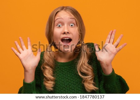 Similar – Image, Stock Photo Amazed woman, she expresses WOW. Impressed lady on yellow background. Great news