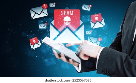 Image showing a person using a tablet, surrounded by spam email icons with skulls on a digital background. Concept of cybersecurity threats