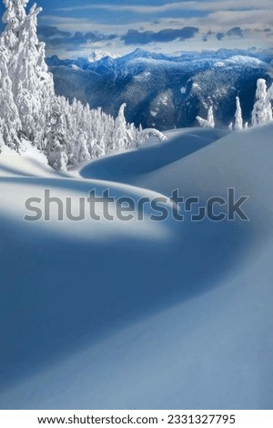 image showing snow dunes in a winter climate to use as a wallpaper.