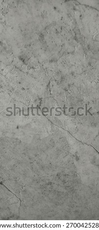 The image shows a wall with a rough texture due to poor material or workmanship.