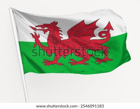 The image shows the Welsh flag, featuring a red dragon on a green and white background. The Welsh flag, with its iconic red dragon, symbolizes Wales. Flag of Wales.
