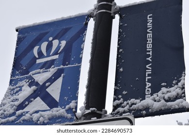 An image of a sign with snow