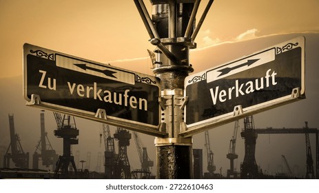 An image with a signpost pointing in two different directions in German. One direction points to Sold, the other points to For Sale.