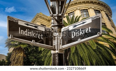 An image with a signpost pointing in two different directions in German. One direction points to Discreet, the other points to Indiscreet.