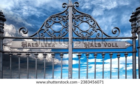 An image with a signpost pointing in two different directions in German. One direction points half full, the other points half empty.