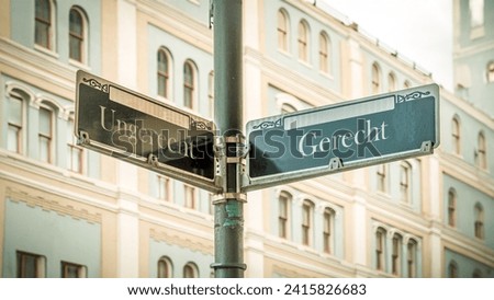 An image with a signpost pointing in two different directions in German. One direction points to righteous, the other points to unrighteous.