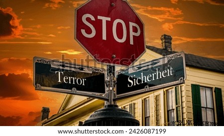 An image with a signpost pointing in two different directions in German. One direction points to security, the other points to terror. Stock photo © 