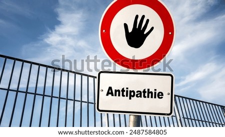 An image with a signpost pointing in two different directions in German. One direction points to sympathy, the other points to antipathy.