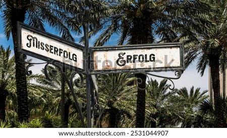 An image with a signpost pointing in two different directions in German. One direction points to success, the other points to failure.