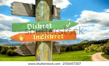 An image with a signpost pointing in two different directions in German. One direction points to Discreet, the other points to Indiscreet.