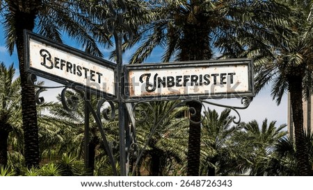 An image with a signpost pointing in two different directions in German. One direction points to Perpetual, the other points to Temporary.