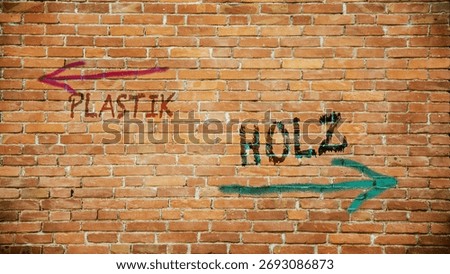 An image with a signpost pointing in two different directions in German. One direction points to wood, the other points to plastic.