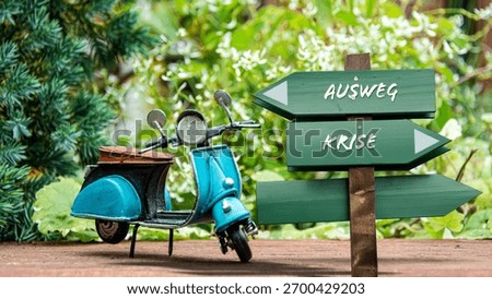 An image with a signpost pointing in two different directions in German. One direction points to a way out, the other points to a crisis.