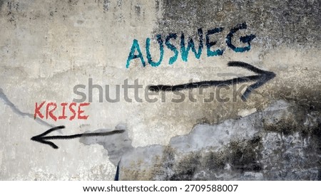 An image with a signpost pointing in two different directions in German. One direction points to a way out, the other points to a crisis.