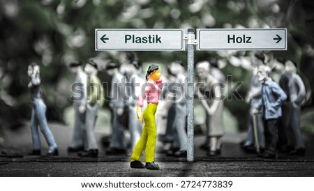 An image with a signpost pointing in two different directions in German. One direction points to wood, the other points to plastic.