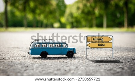 An image with a signpost pointing in two different directions in German. One direction points to a way out, the other points to a crisis.