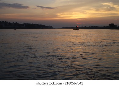 Image Of Silhouette, Rower At Sunset