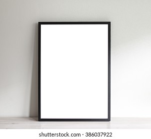 Image of simple poster frame mockup scene. 