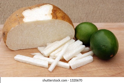 Image Of Sliced Jicama And Ripe Limes