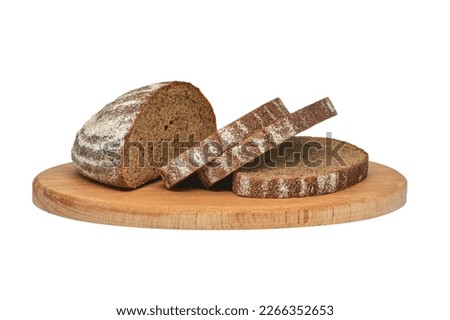 Image of sliced rye bread on a wooden plank
