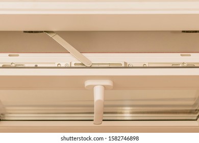 Image Of A Small Plastic Window With Hardware Elements