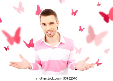 Image of smart guy looking at camera surrounded by pink paper butterflies