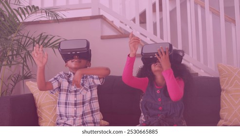 Image of smiling african american siblings using vr headsets. national siblings day and celebration concept digitally generated image. - Powered by Shutterstock