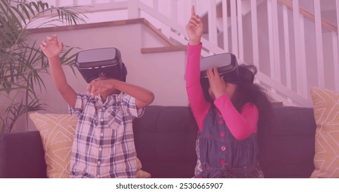 Image of smiling african american siblings using vr headsets. national siblings day and celebration concept digitally generated image. - Powered by Shutterstock