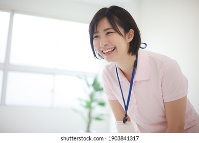 Image of a smiling caregiver 