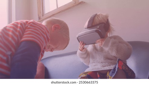 Image of smiling caucasian siblings playing with vr headset. national siblings day and celebration concept digitally generated image. - Powered by Shutterstock