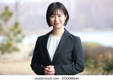 Image Of A Smiling Female Office Worker 