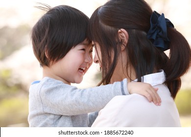 Image of smiling parents and children - Shutterstock ID 1885672240